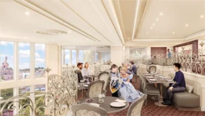 Interior del restaurante en Disneyland Hotel con vista al castilloComedor elegante con vista al castillo de Disneyland París
